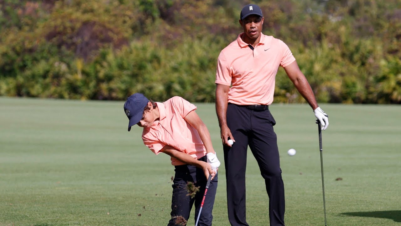 Tiger Woods and Charlie on the Range