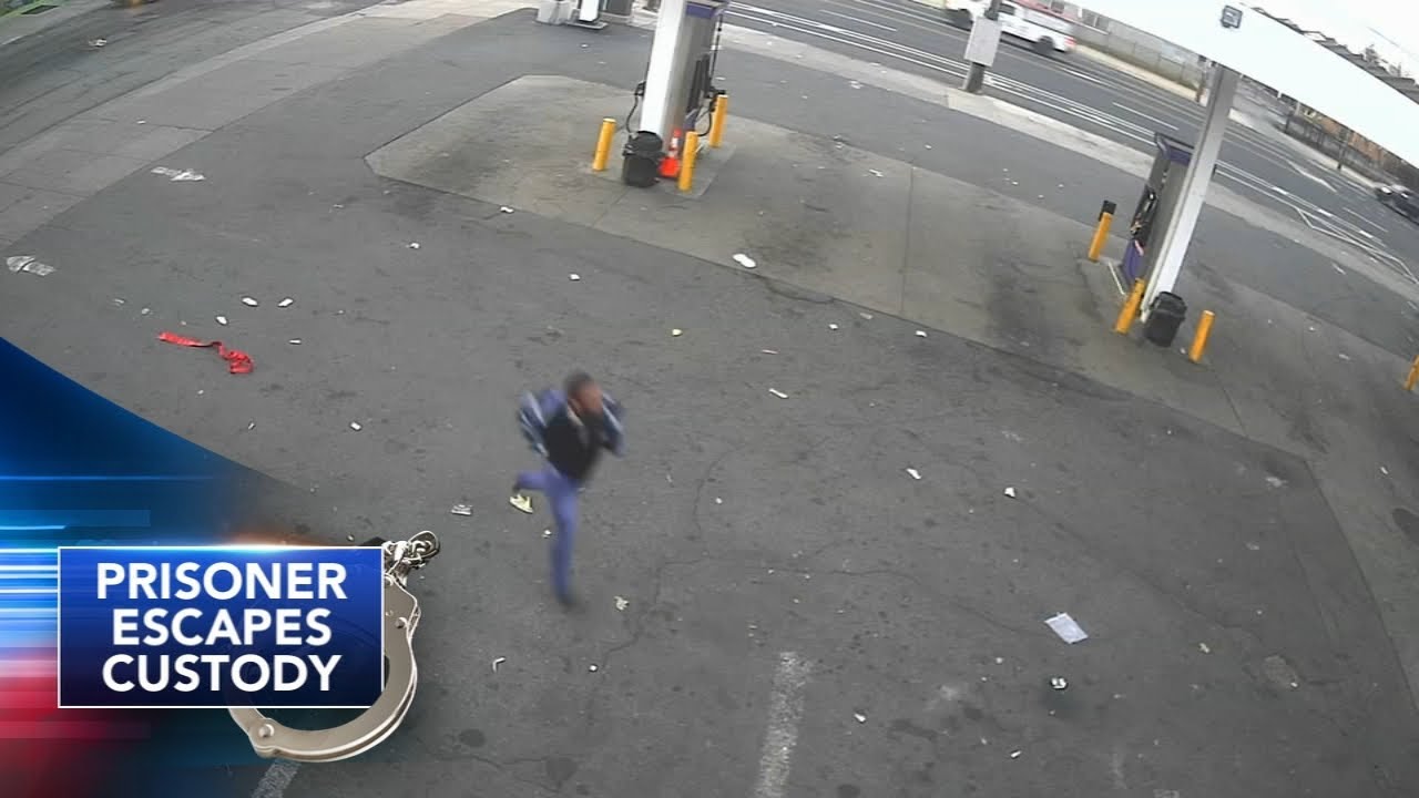 New video shows handcuffed prisoner running across parking lot moments after escape from hospital