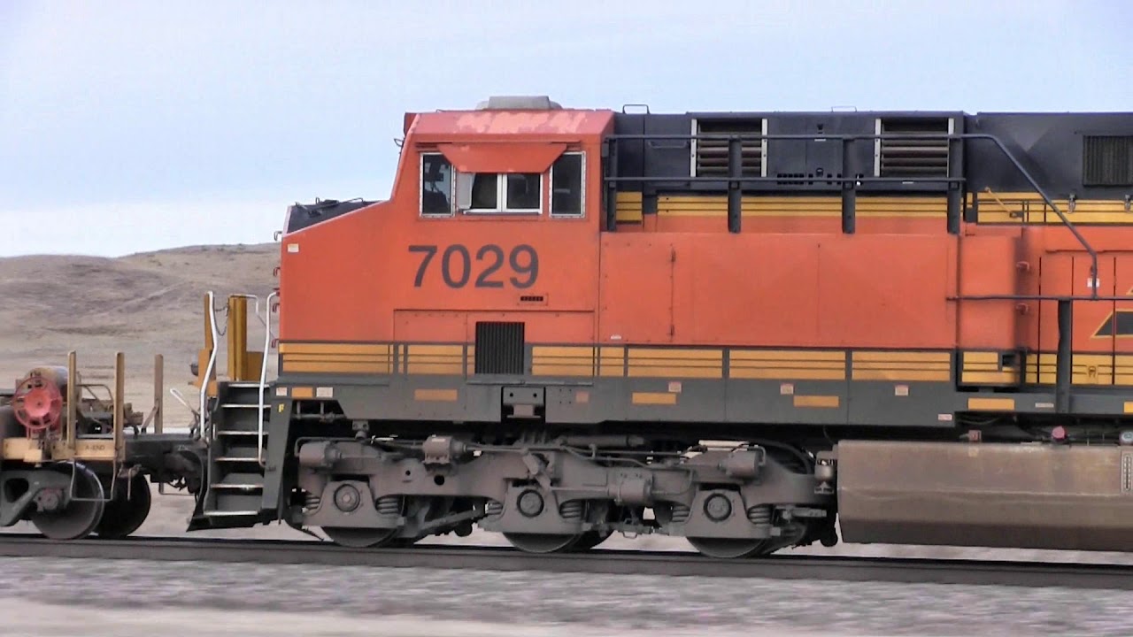 BNSF pusher locomotive sounds like a jet engine as it passes by.