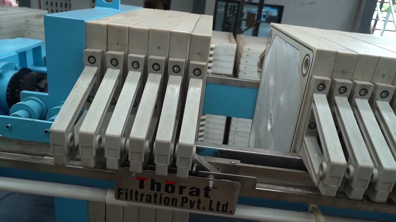 Automatic plate shifter filter press with belt conveyor info@thoratfiltration.com