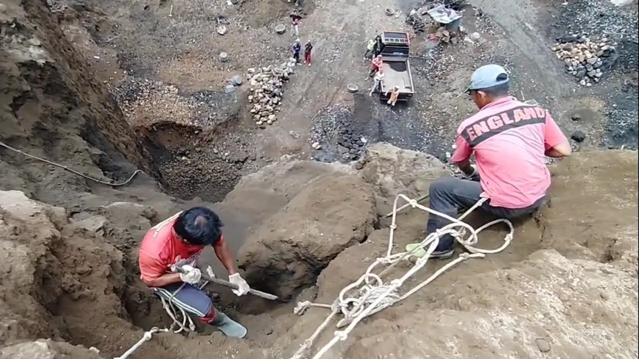 process of dropping a rock from a cliff and destroying it once it is at the bottom