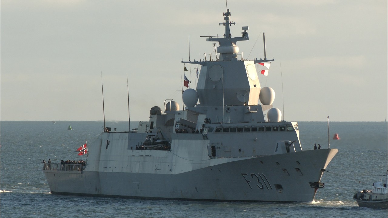 Norwegian warship transports British military helicopter back to England after Carrier Strike Group