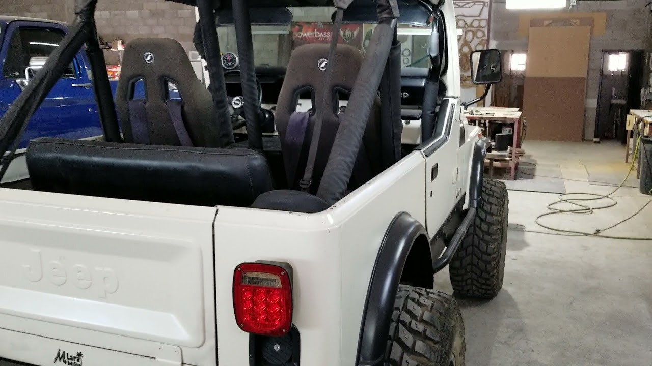 85 CJ7 custom sound system and custom door panels center console and rear speaker pods