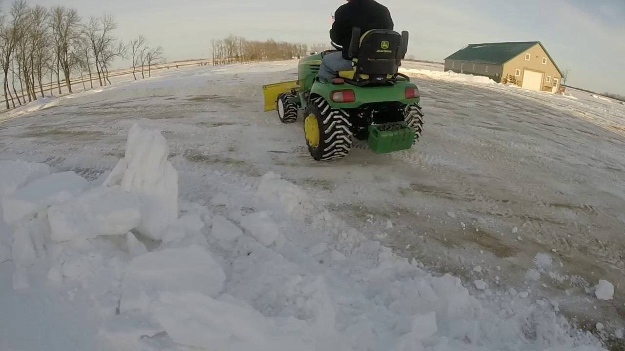 John Deere X748 Moving Snow March 2017