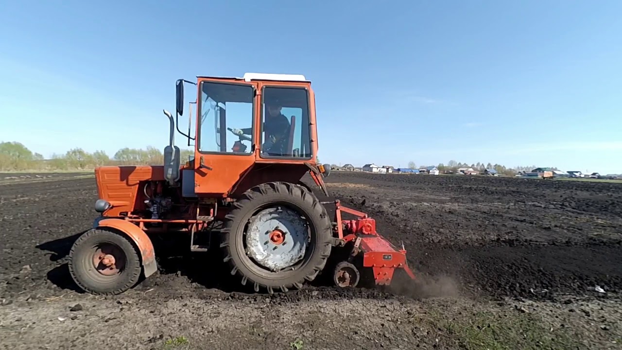 Фрезерование с помощью почвофрезы 1 GQN-160.Трактор т-25.