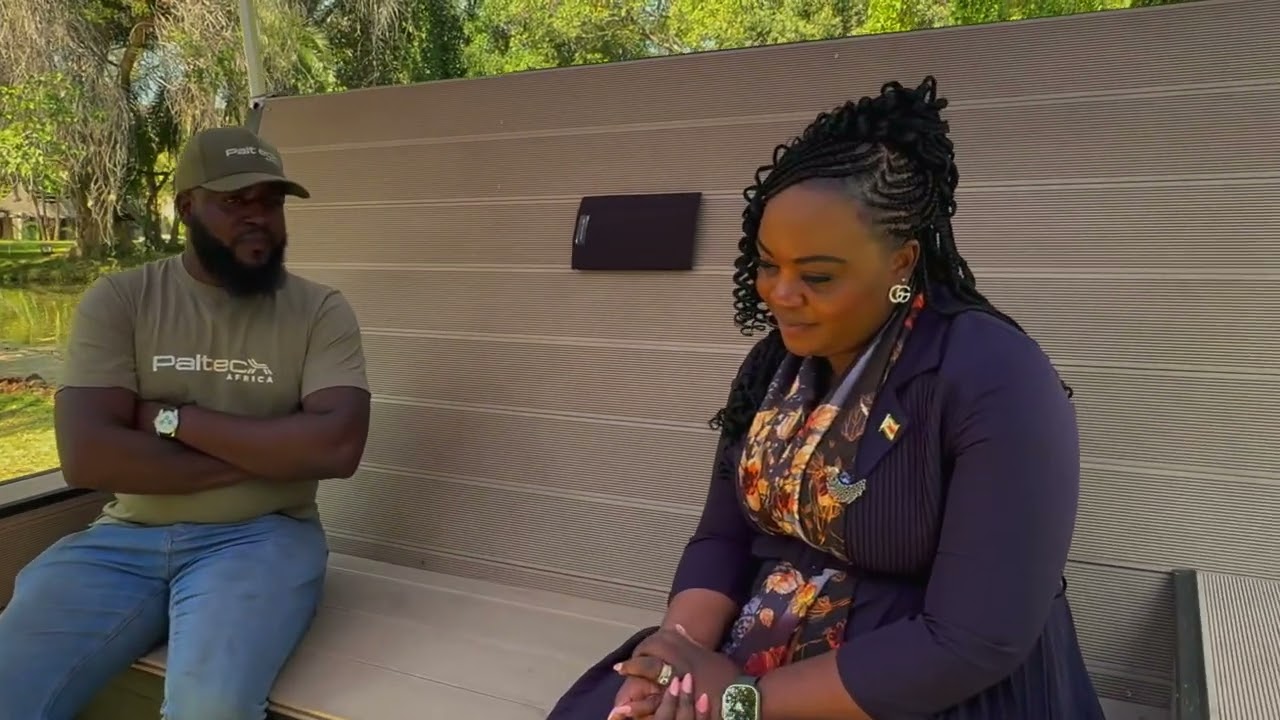 Zimbabwe's Minister of ICT Talks to a bench