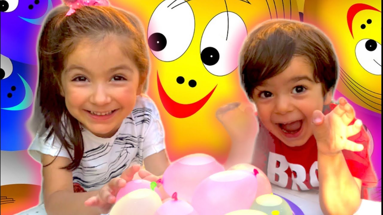 Su balonları yaptık.Tuğra ve Busem balonlara su doldurup patlattı.(çocuk ve eğlence videoları) TUĞRA