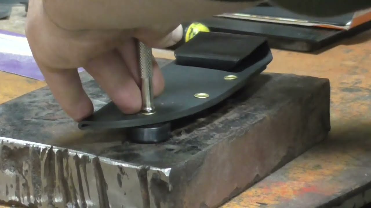 How to install kydex eyelets with a hand setter.