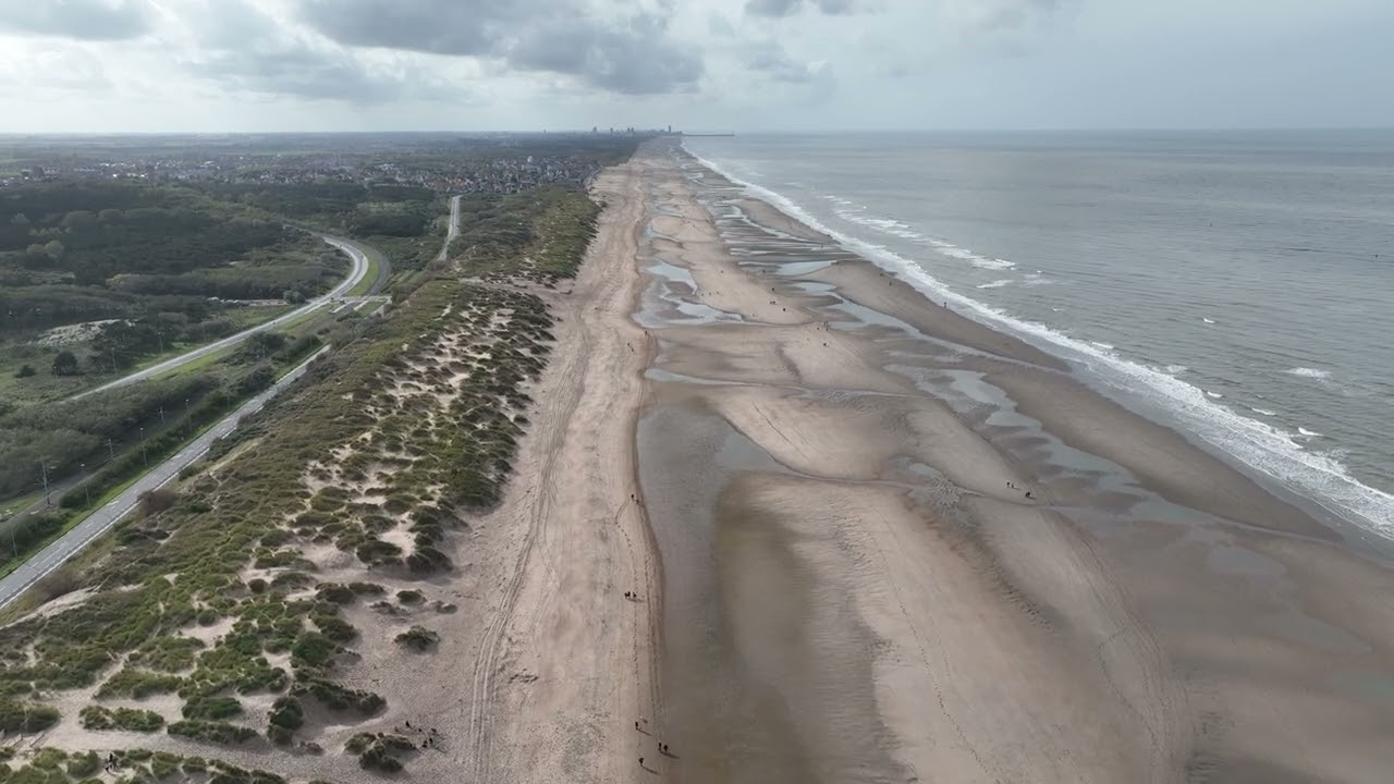 Het strand in De Haan aan zee. La plage du Coq-sur-Mer.