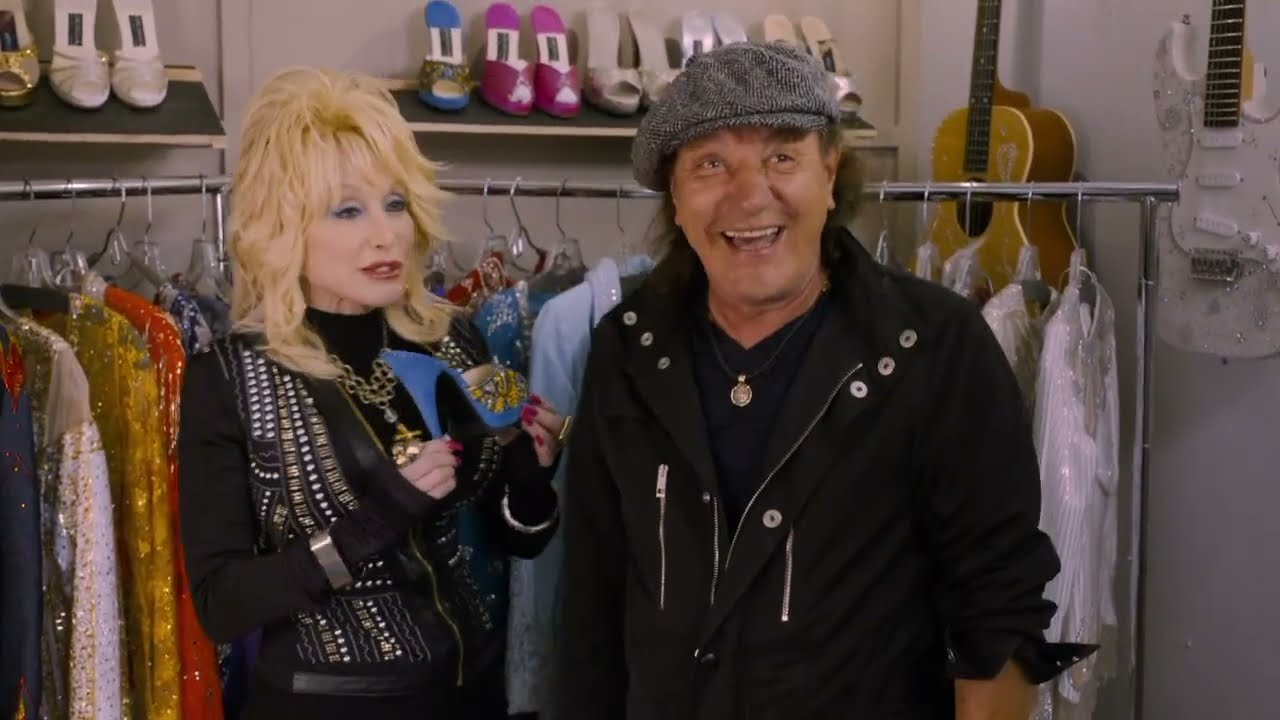 Brian Johnson surprises Dolly Parton in her dressing room