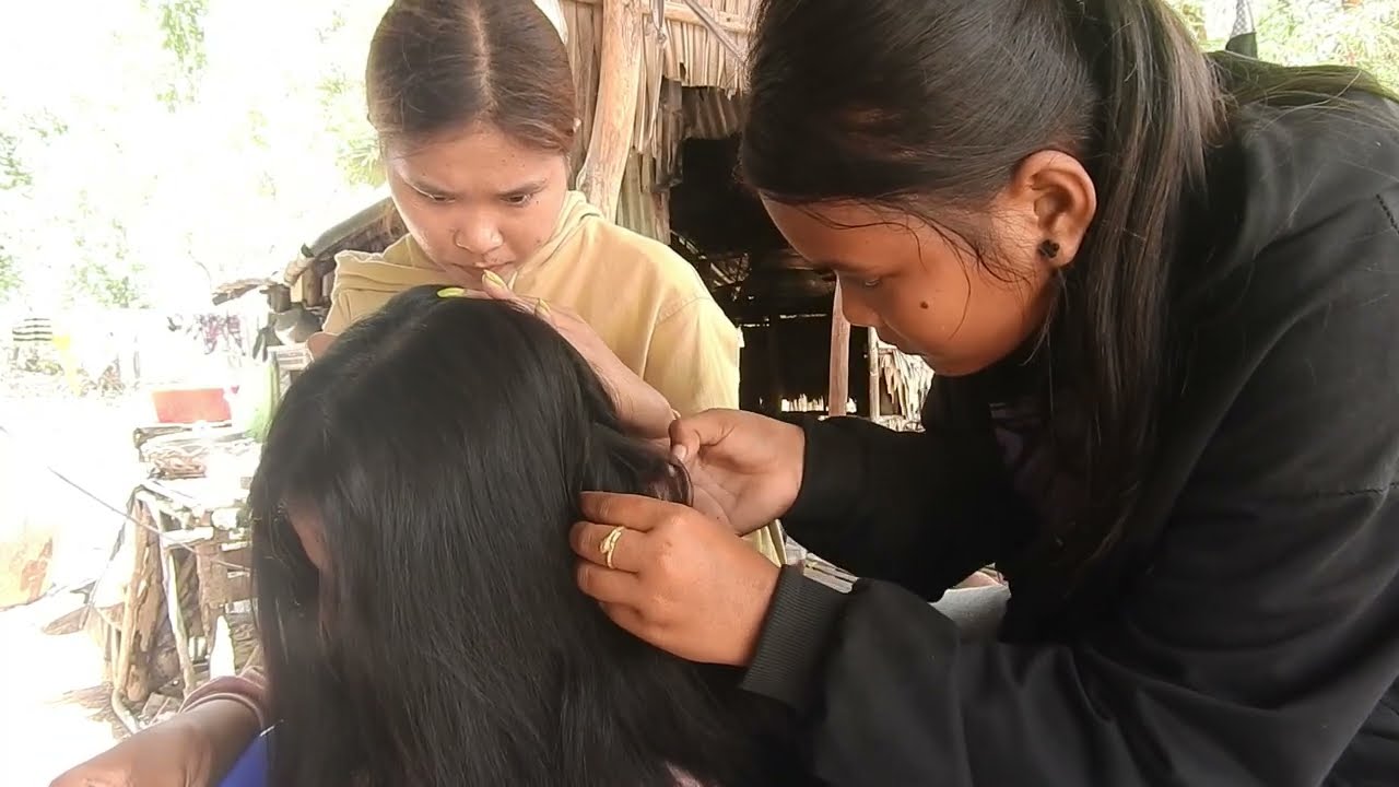 Help poor girl nits picking in long hair 