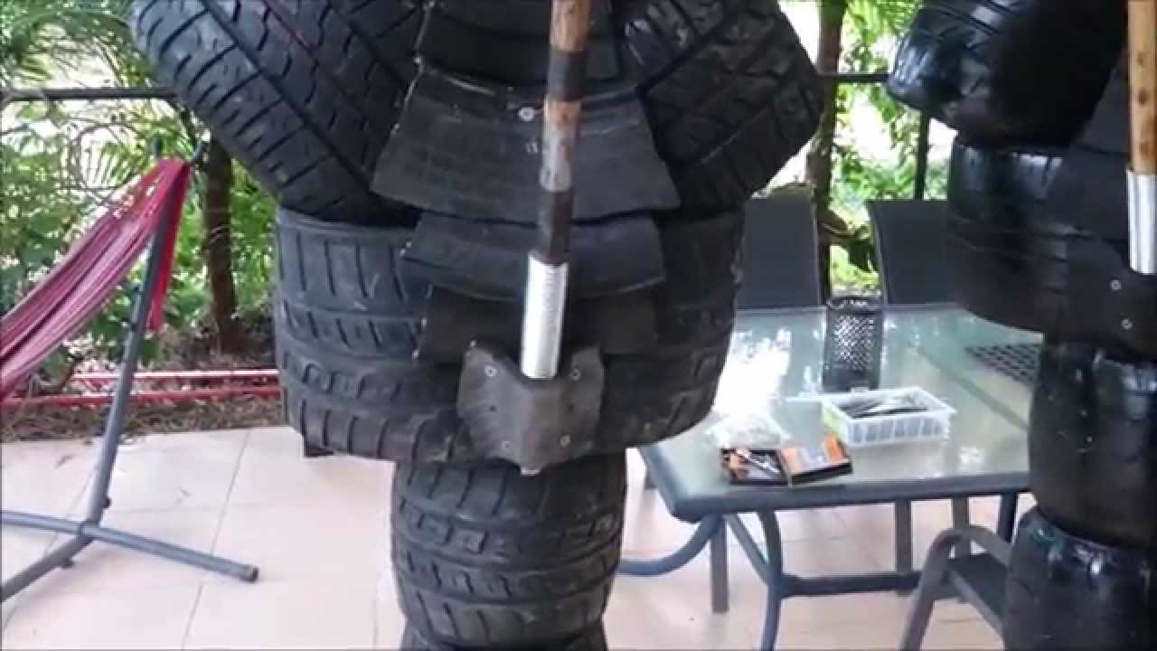 How to make an Eskrima Training dummy 5: spring mounted stick system.