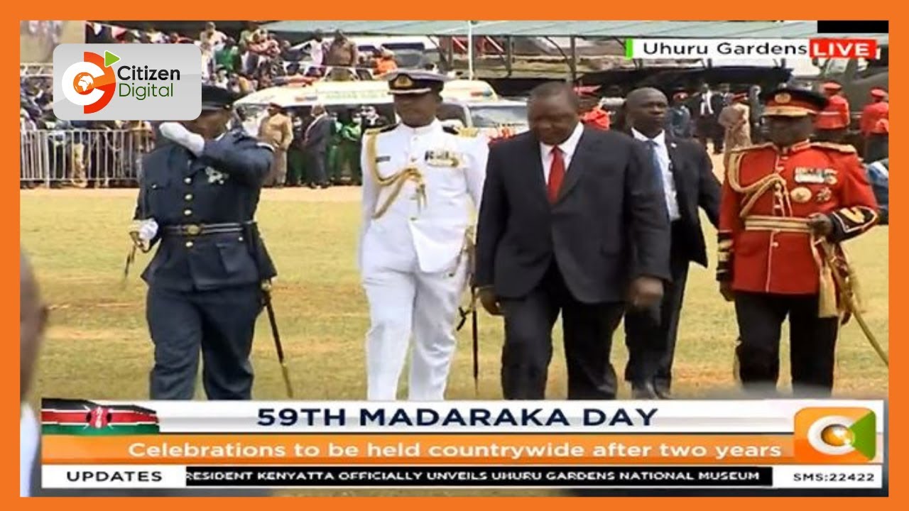 President Uhuru Kenyatta inspects guard of honour at Uhuru Gardens during the 59th Madaraka Day