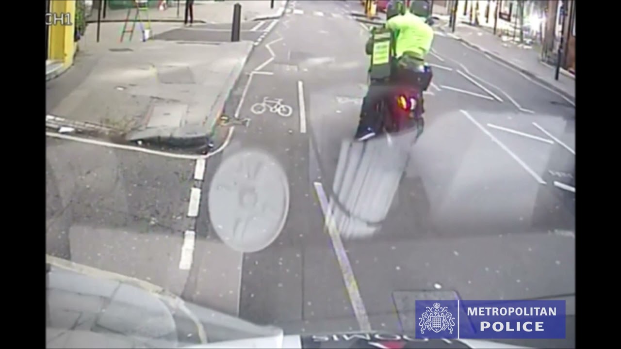 Cash In Transit / Cash Delivery Driver robbed in Clerkenwell Rd, London. Robbers escape on a moped.