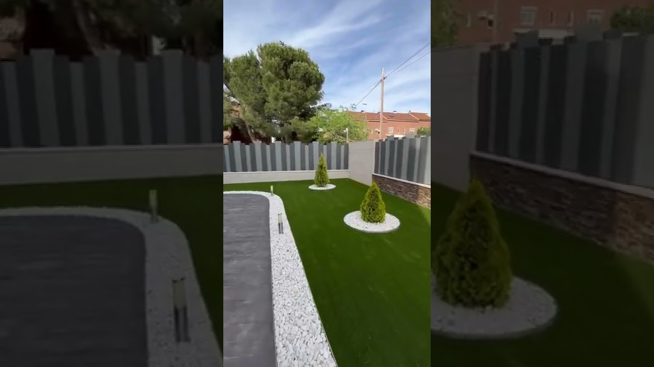 C&eacute;sped artificial,canto rodado blanco y jardineras de acero corten.