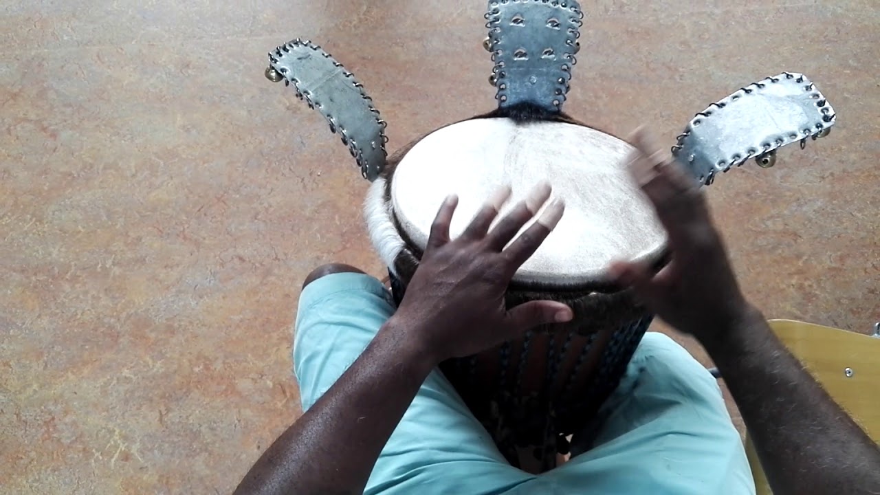 Patrick Ngambi playing the Djembé rhythm Madiba