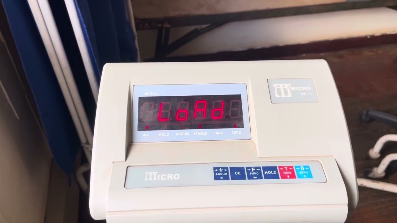 Calibrating digital scale Micro pf-1