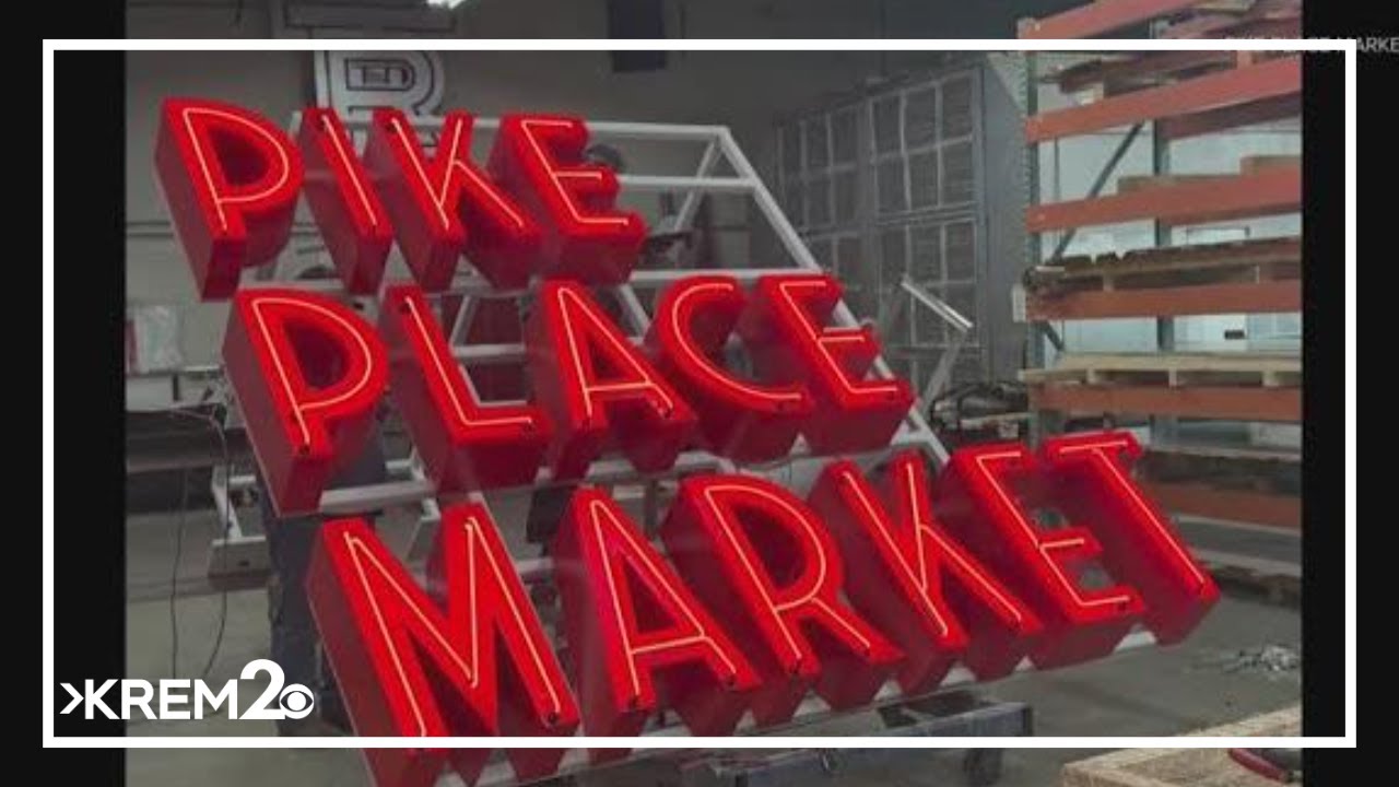 Pike Place Market installs new sign; original sign remains facing Pike Street