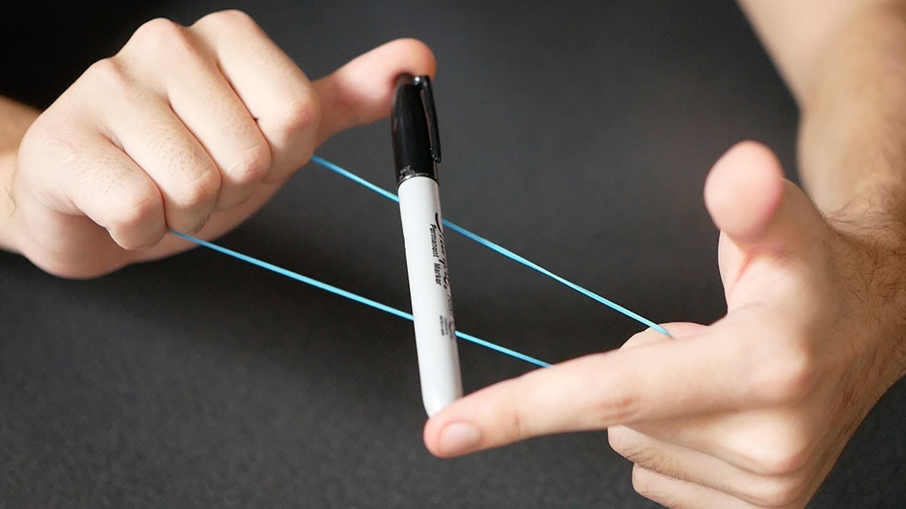 LE STYLO À TRAVERS L'ÉLASTIQUE - TOUR DE MAGIE FACILE