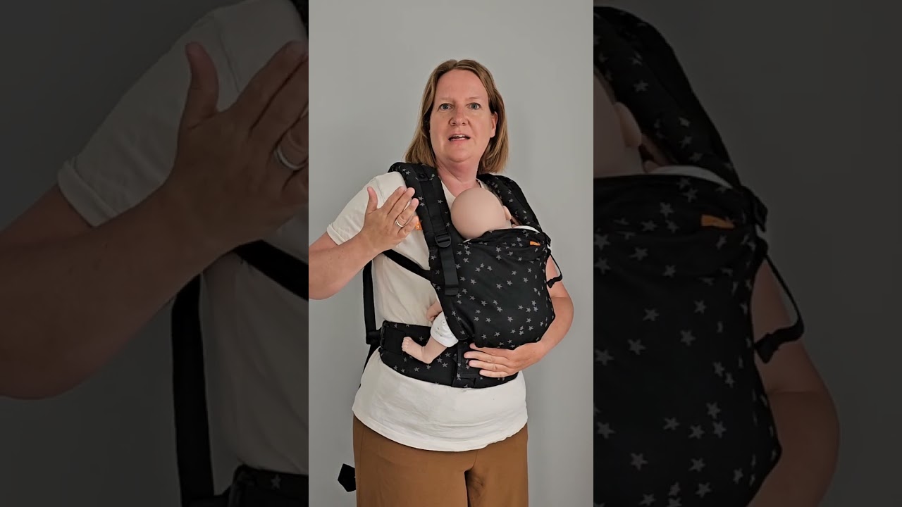 Hoe plaats je een baby mooi over de tailleband van een draagzak?