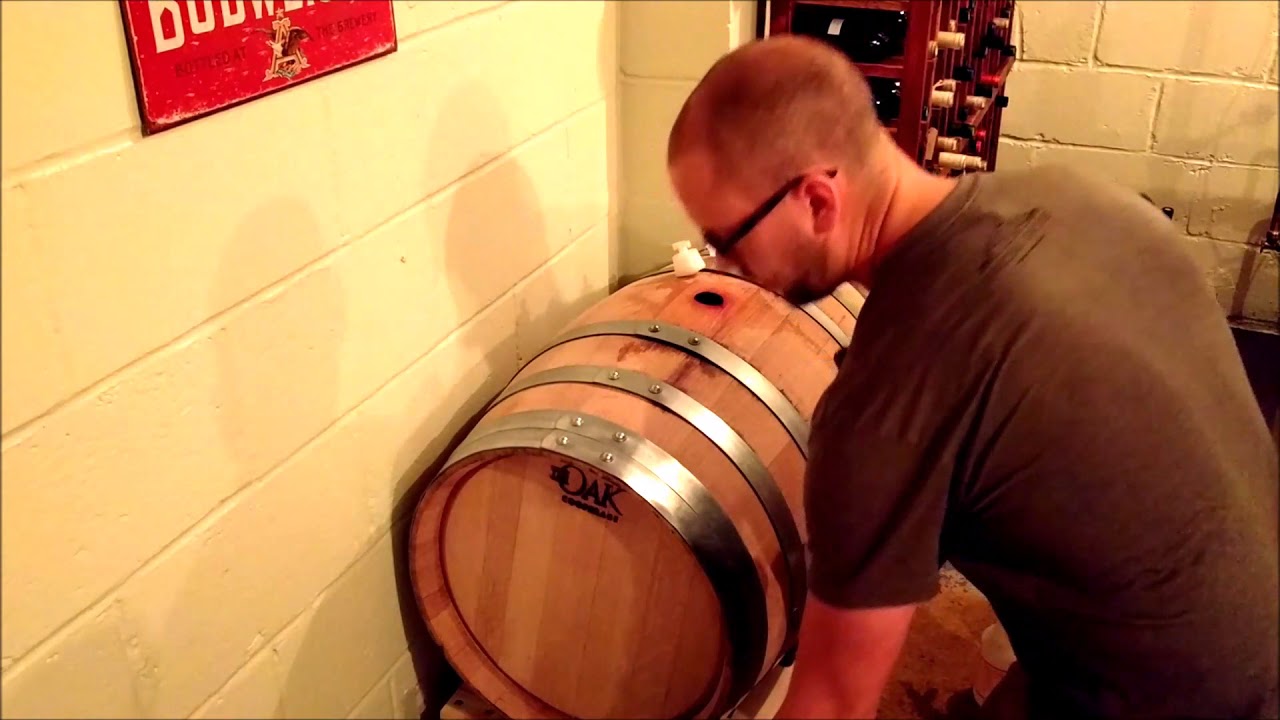 Topping up an Wine Barrel to Prevent Oxidation