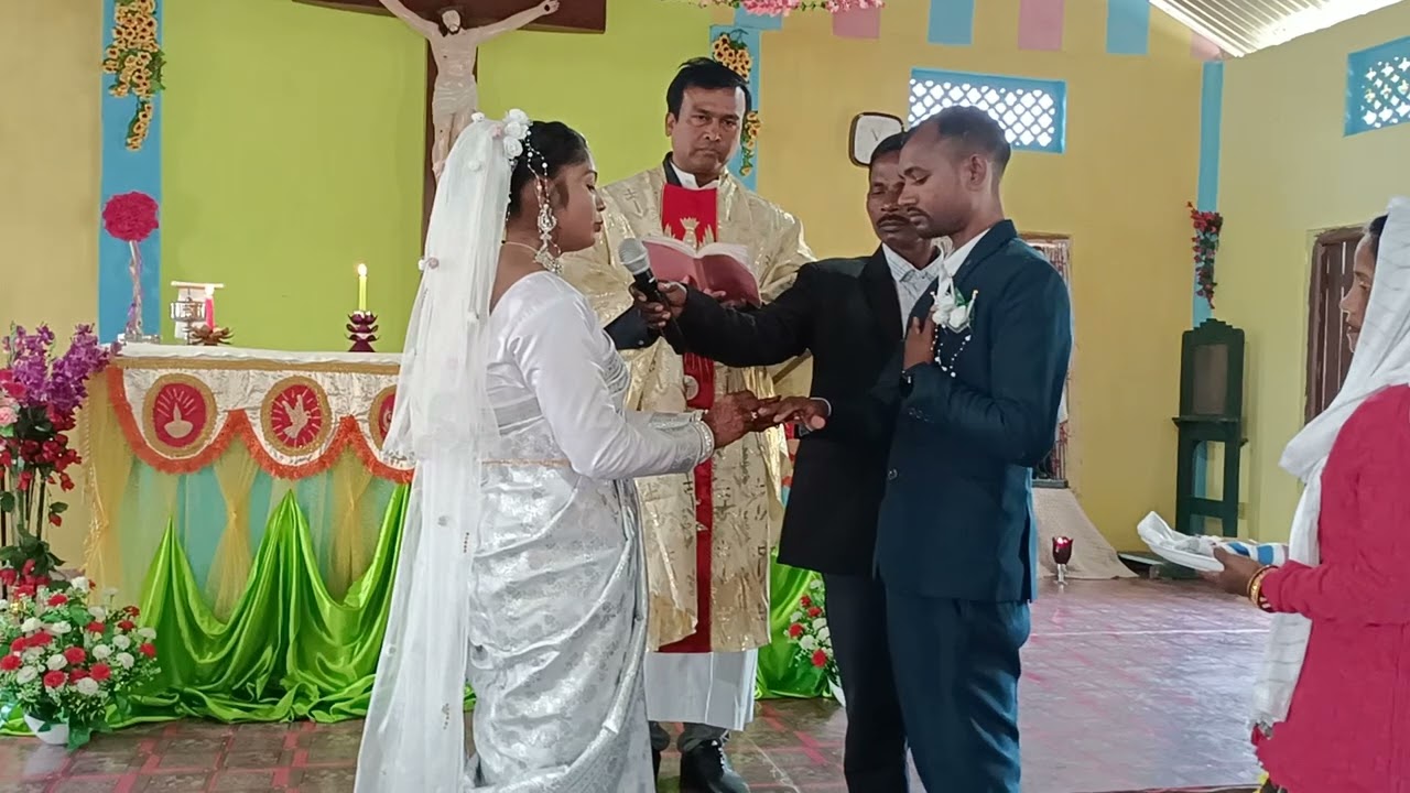 Premika and Alfred marriage blessing Fr.Profullo Kerketta .....in our Borhat catholic Church.