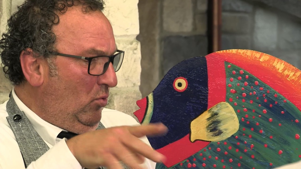 FILETTO DI BRANZINO AL CARTOCCIO - Video Ricetta - Grigio Chef