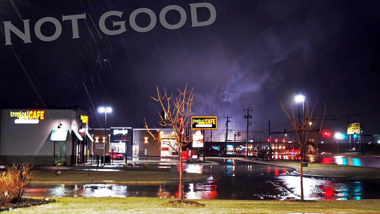 Tornado sneaks up on storm chaser when he gets fuel...