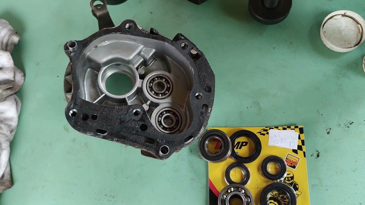 GY6 50cc scooter rear wheel bearing, clutch, rear brake pads, engine & transmission oil replacement