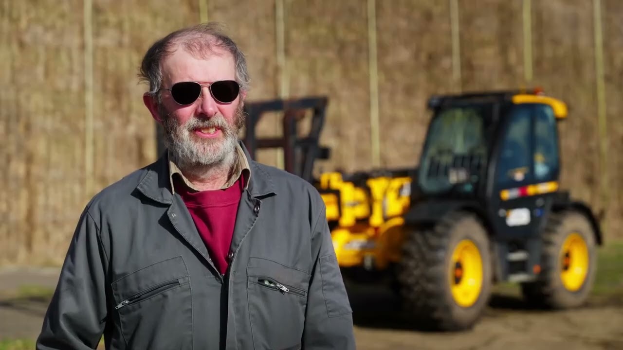Baling with the JCB 542 100 AGRIPRO Loadall | Roger Justice