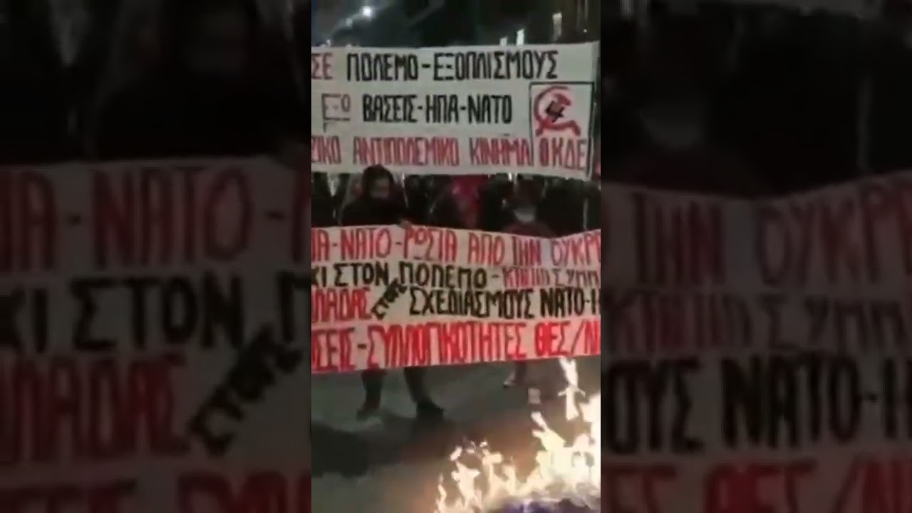 Mass uprising against NATO have begun in GREECE 🇬🇷  Demonstrators in Thessaloniki burn 🔥 a NATO flag