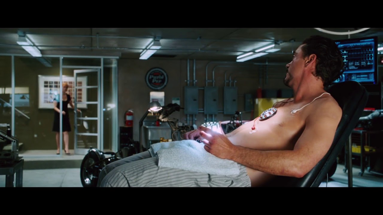 Iron Man (2008) | Pepper helps change Tony's Arc Reactor