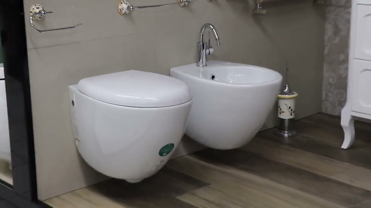 Offerta sanitari sospesi Made in Italy - Wc + Bidet + Copri-wc Domus Falerii 52 x 36 cm.