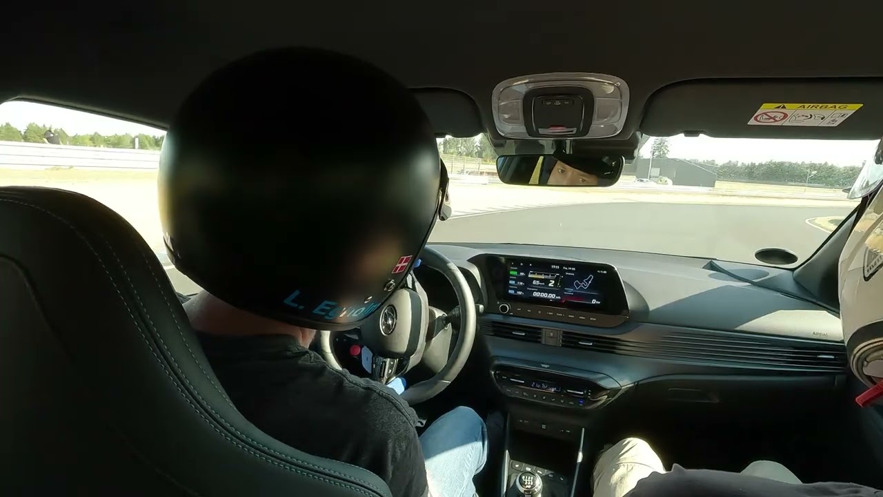 Hyundai i20N with Porsche playmates, at Jyllandsringen 19. may 2023