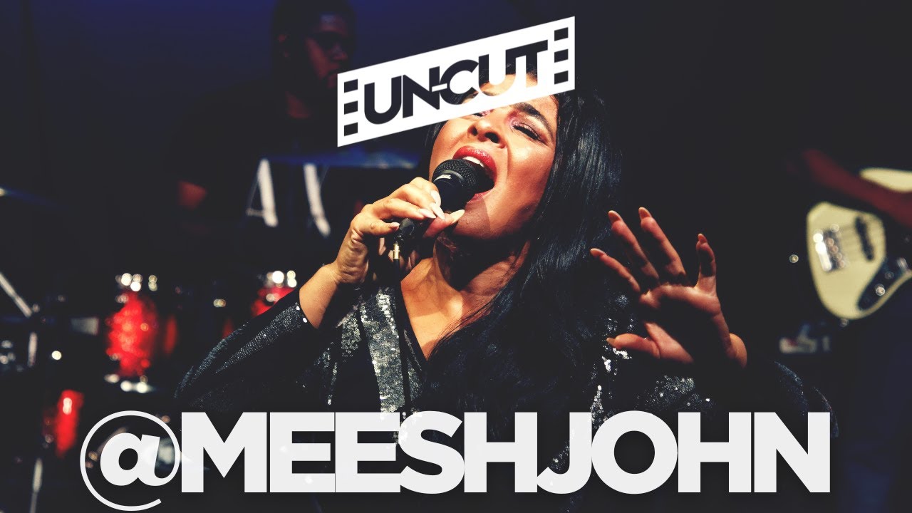 Michelle John performing and having fun with band track 