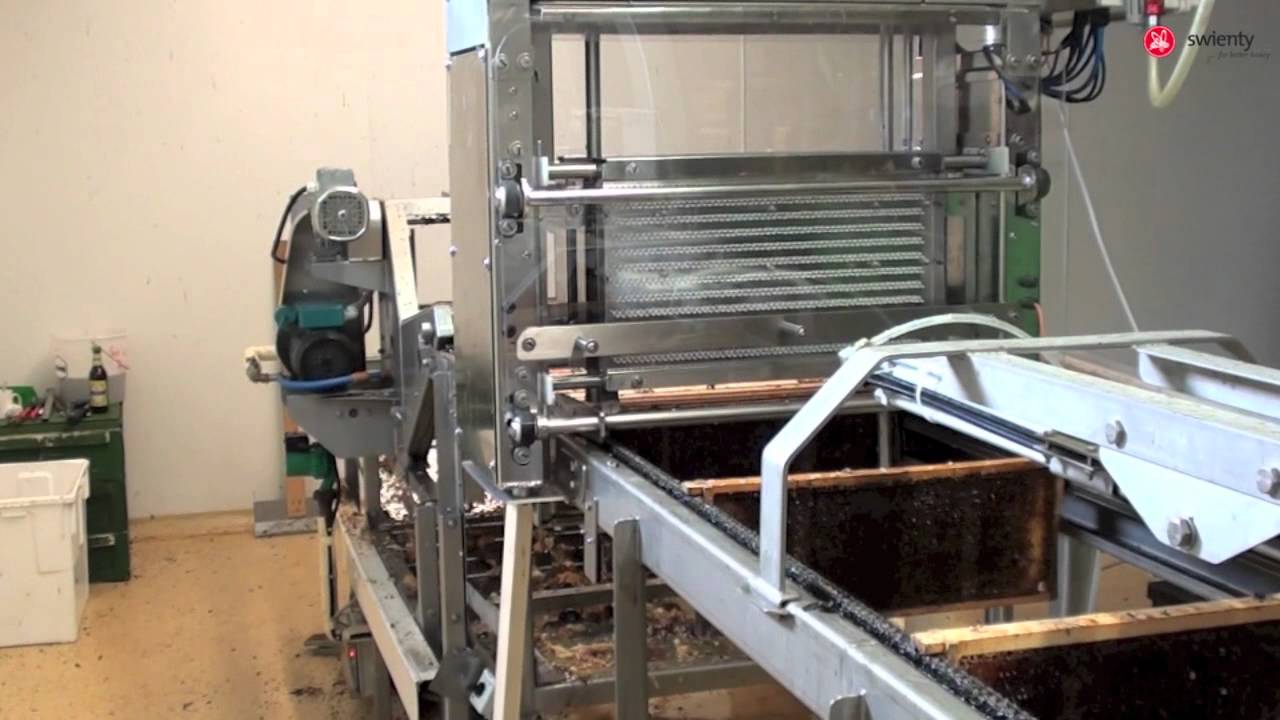 107421 - Swienty A/S - Boutelje fully automatic loosener and uncapper