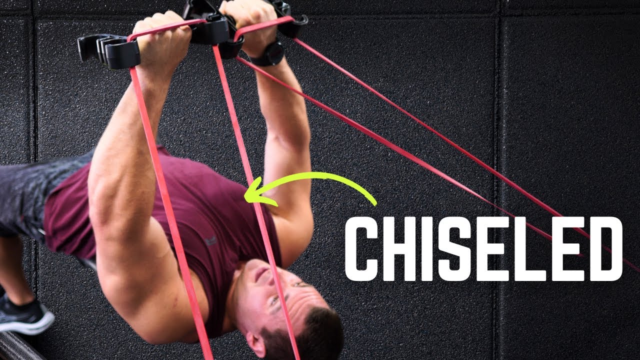 The Secret to a Sculpted Lower Chest with this Overhead Fly Exercise