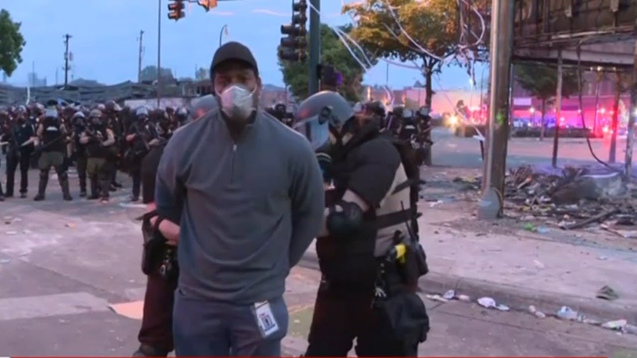 Minneapolis Governor apologises after reporter is arrested live on air