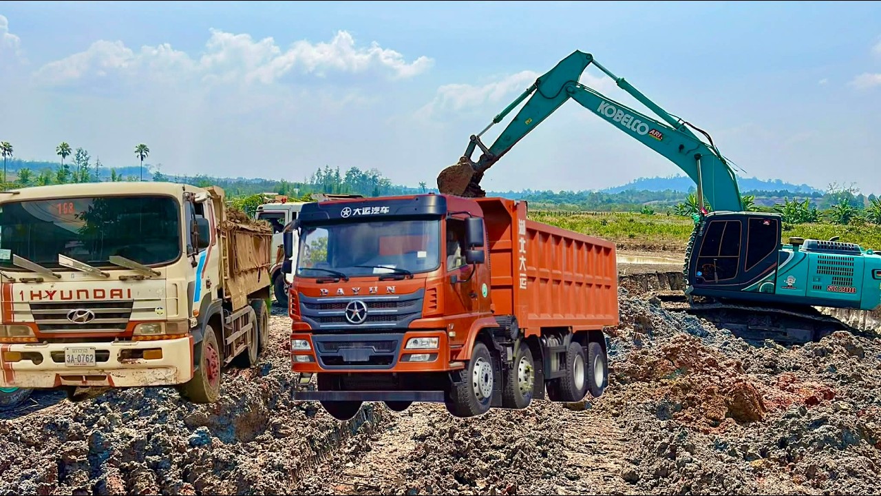 Two dump trucks and an excavator work together in a fun way