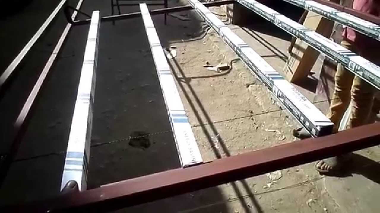 تثبيت اللمبات النيون داخل الشاسيه المضىء للافتات الفلكس