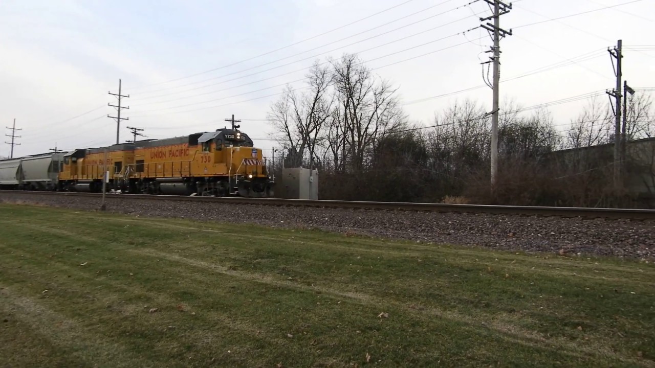 UPY 730  and UPY 715 lead LPJ04 the Troy Grove sub local east in Geneva IL