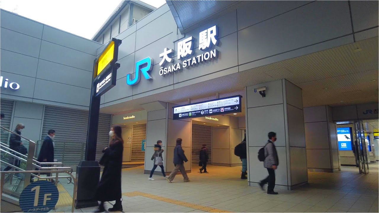 Osaka's People Commuting to Work and School on Rainy Wednesday Morning.