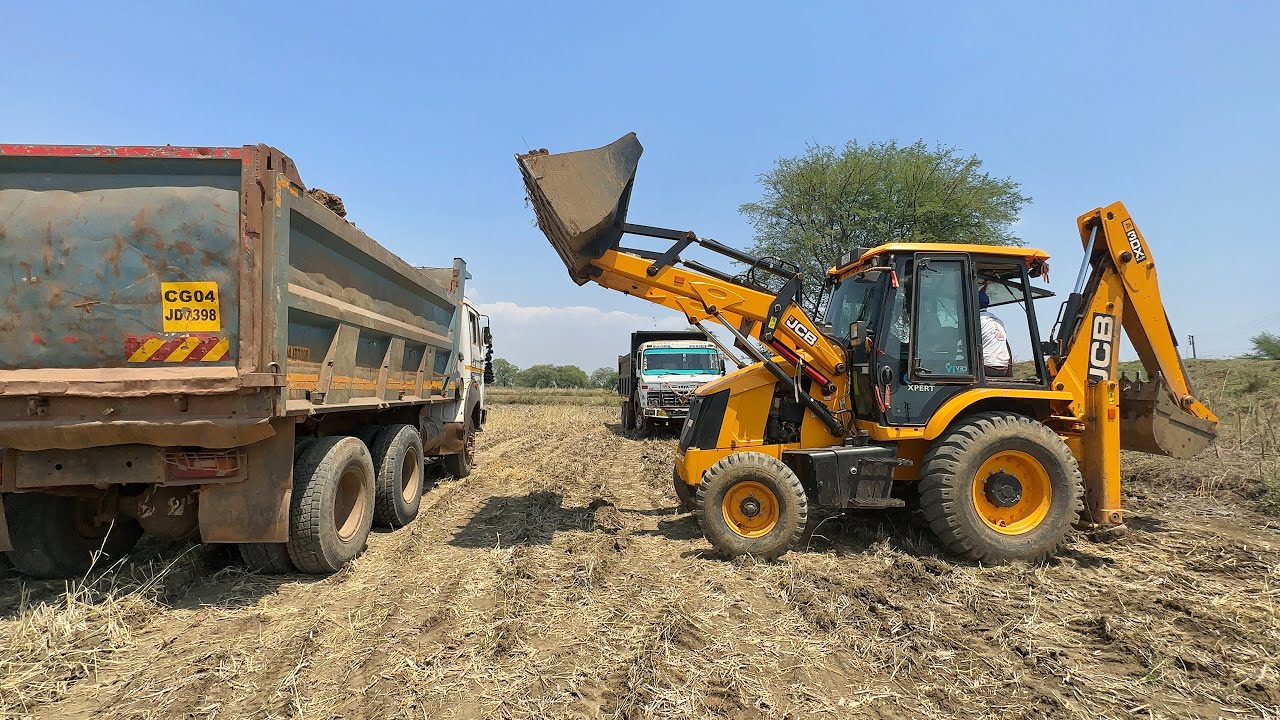 JCB 3dx Plus Xpert Loading Mud in Double Tata 2518 Truck For Making Road