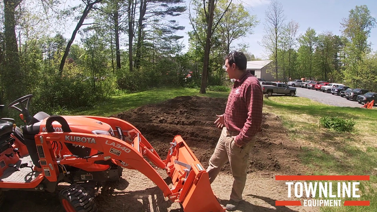 Kubota BX23S Compact Tractor w/ Land Pride RTA1250 Tilling for a Garden