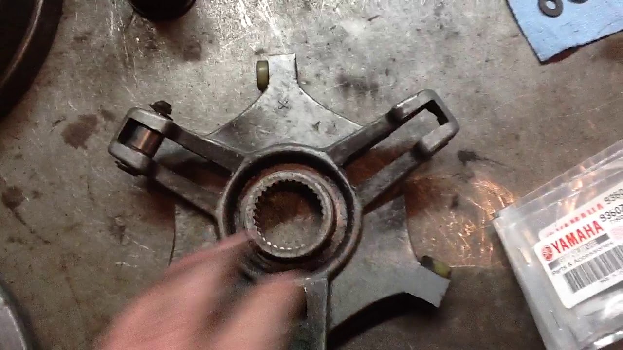 Repairing the primary clutch on a Yamaha Enticer