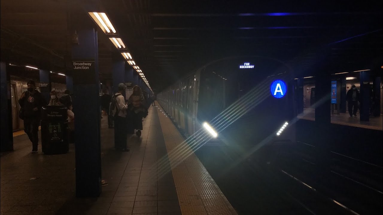 (A) (C) trains with R211 move action at Broadway Junction