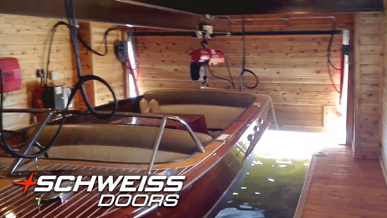 Inside the Boathouse with a Schweiss Hydraulic Door on Lake Vermillion
