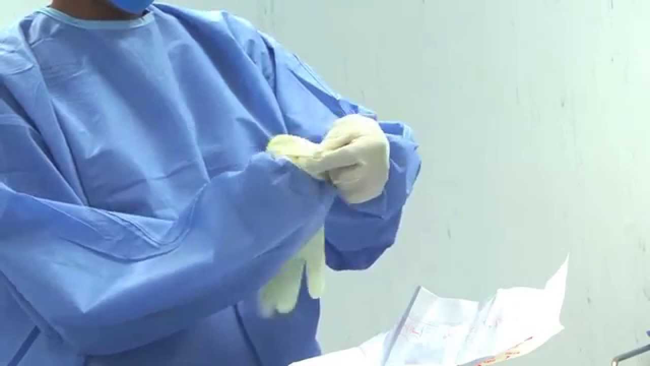 Técnica colocación de bata y guantes (técnica cerrada)