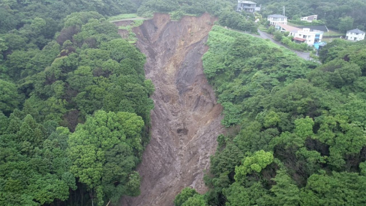 Japan landslide: 80 missing as rescuers race against time to comb through mud