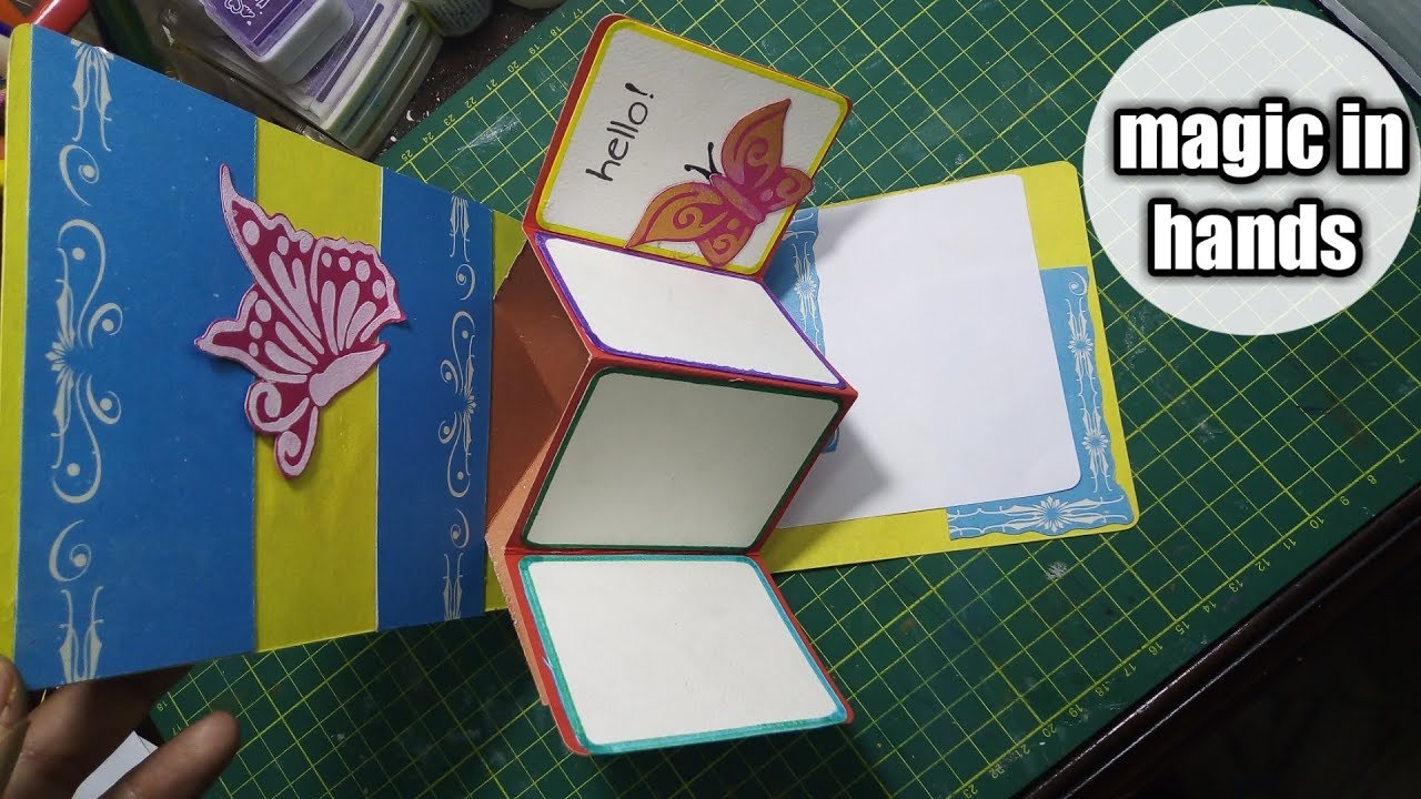 Twist and pop-up handmade greeting card by magic in hands.